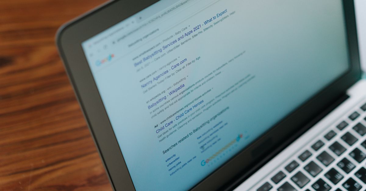 Browser window with an AI assistant sidebar open next to search results